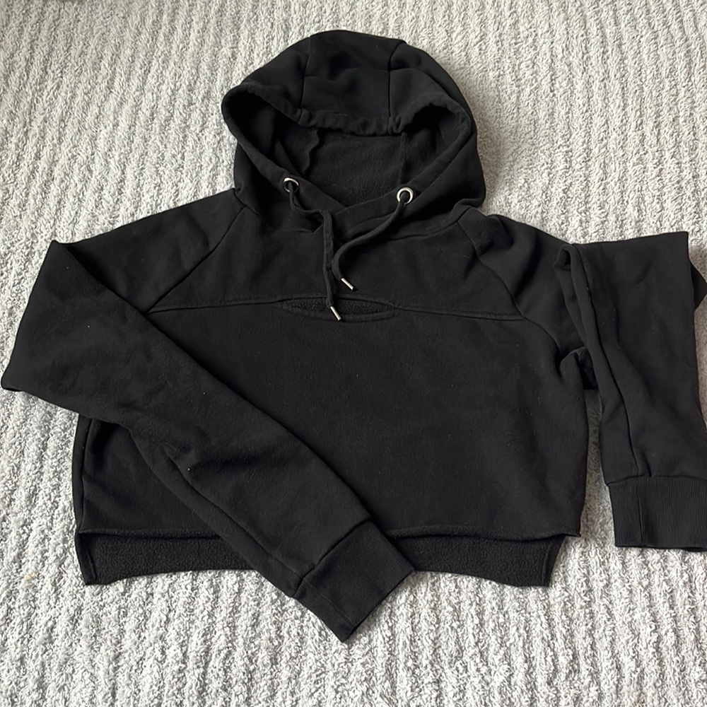 Forever 21 cropped black hoodie eith a little slit on the front